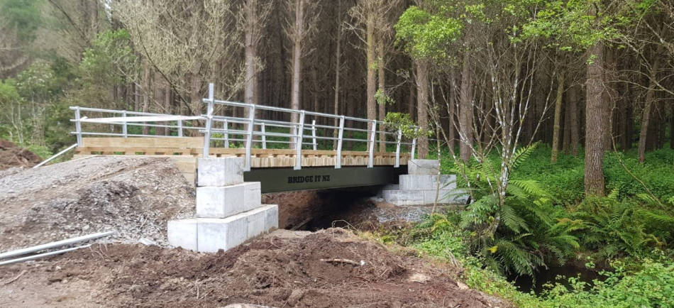 Bridge suitable for forestry activity good for tracked machinery including fully laden logging trucks